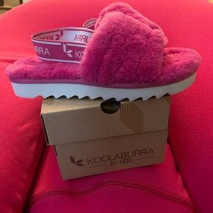 Kookaburra by Ugg Girls sling back fuzzy slippers.